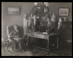 Portrait of the dentist Dr. Gibson and three women in his residence